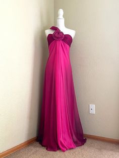 "Excellent Vintage Condition - Pink Ombre One-Shoulder Dress w/ Rose Gorgeous, flowy dress for any occasion! The silhouette helps creates a fitted/lengthy figure. The ombre fabric shows different shades of pink throughout the garment in a subtle yet beautiful way. Overall this gown is in excellent vintage condition. There are no spots/stains/holes on the gown.  Labeled as size 8 Measurements: Chest: 32\" Waist: 28\" Length: 70.8\"" Pre-draped Pink Silk Evening Dress, Pink Pre-draped Floor-length Evening Dress, Pink Flowy Floor-length Evening Dress, Flowy Pink Chiffon Evening Dress, Pink Chiffon Evening Dress For Cocktail, Pink Chiffon Cocktail Evening Dress, Pink Pre-draped Silk Evening Dress, Pink Pre-draped Evening Dress For Cocktail, Pink Chiffon Evening Dress For Gala