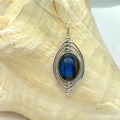 Beautiful Blue Labradorite Sterling Silver Wrap Design Pendant With 18” Diamond Cut Sterling Silver Chain. All Items Come Gift Boxed. Labradorite Blue Necklace As Gift, Nickel-free Blue Labradorite Jewelry, Wired Jewelry, Stone Wrapping, Cabochon Pendant, Blue Labradorite, Shop Ideas, Hand Made Jewelry, Wrapped Pendant