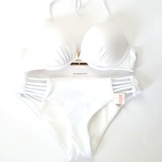 Victoria's Secret 2 Piece Bundle: This Bundle Includes The Following: 34a Bombshell Bikini Top Bombshell Adds 2 Cups Sizes New W Tags Attached & Bottoms Size Small New W Tags Attached No Trades # Keywords: Bikini, Bikini Set, Swimming Suit, Bathing Suit, Swimwear, Bombshell Bikini Top, Miraculous Bikini Top, Push Up Bra Elegant White Swimwear With Padded Cups, Chic White Swimwear With Padded Cups, White Fitted Victoria's Secret Swimwear, White Two Piece, Swimming Suit, Victoria Secret Swim, Push Up Bra, 2 Cups, Bathing Suit