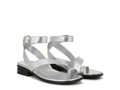 Naturalizer Birch Ankle Straps - Women's Sandals : Silver Faux Leather : Supportive and stylish, the Naturalizer Birch Ankle Straps is a masterpiece for your feets. Crafted from leather or synthetic upper, polyurethane lining and EVA insole, this pair of sandals features open round toe, Contour+ Comfort technology for a premium fit and all-day comfort experience, toe loop with adjustable ankle straps and brand infinity buckle detailing. It comes with low-stacked heel and brand detailing on the footbed. Synthetic rubber outsole. Imported. Measurements: Heel Height: 1 1 8 in Weight: 8.5 oz Product measurements were taken using size 7, width M (B). Please note that measurements may vary by size. Trendy Flats, Oxford Boots, Strappy Sandals Flat, Famous Footwear, Synthetic Rubber, Sandals Brands, Calf Boots, Ankle Straps, Ankle Strap Sandals