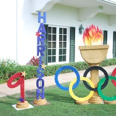 the olympic symbols are on display in front of a building