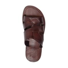 Model wearing Mateo brown, handmade leather slide sandals Mens Slide Sandals, Ankle Strap Sandals Flat, Toe Loop Sandals, Soft Leather Handbags, Laser Cutout, Leather Gladiator Sandals, Closed Toe Sandals, Brown Leather Sandals, Men's Sandals