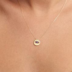 "Our 14k Solid Gold Sapphire Evil Eye Necklace is here for provide a shiny protection for you and your loved ones. Ward off the bad energy around you with an elegant look. F E A T U R E S * Made to Order. * Gold KT: 14K * Choice of Gold Color: Yellow Gold, Rose Gold, White Gold * Gem Stone: Genuine Diamond * Diamond-Cut: Round * Diamond Carat: 0.05 ct. * Sapphire Carat: 0.14 ct. * Pendant Height: 12 mm / 0.47 inch * Pendant Width: 12 mm / 0.47 inch * Diamond Color-Clarity: H Color, SI Clarity * 14k Yellow Gold Birthstone Necklace With 17 Jewels, Custom 14k Gold Necklace, Fine Jewelry Birthstone Necklace In Yellow Gold, 14k Gold Necklace With Round Birthstone Pendant, 14k Gold Round Pendant Necklace With Birthstone, 14k Yellow Gold Birthstone Necklace With Round Pendant, 14k White Gold Birthstone Necklace, 14k Gold Custom Necklace, Custom 14k Gold Fine Jewelry Necklace