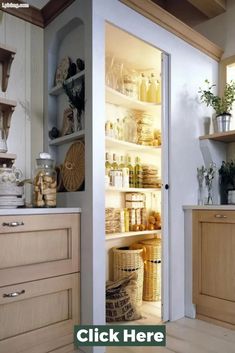 an open pantry door in a kitchen with lots of items on the shelves and drawers