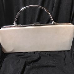 Judith Leiber Overture Vintage Structured Handbag Satchel Clutch Never Used Personally But Has Minor Signs Of Use Due To Storage / Vintage Including Slight Chrome Discoloration Snap Closure With Interior Pocket Gorgeous Pearl Satin Exterior Approx Measurements In Inches: Length: 13” Height:(Excluding Handle Just Body) 5.25” Bag Handle Drop:3.5” Feel Free To Make An Offer Or Bundle To Save Structured Handbags, Vintage Clutch, Judith Leiber, Bag Handle, Vintage Bags, Vintage Silver, Vintage Ladies, Satchel, Top Handle Bag