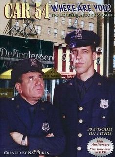 there are two police officers standing next to each other on the cover of car 54 where are you?