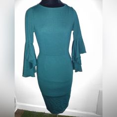 Nwt Vfshow Bell Ruffle Sleeve Bodycon Sheath Midi Pencil Dress Dark Green Blue Size Xs This Lovely, Slimming, Feminine, And Elegant Dress Is Professional And Understated. The Fabric Is Slightly Stretchy. Beautiful High-Low Bell Sleeves. Round Scoop Neckline And Form Fitting. Sexy, Yet Modest. Midi Knee Length. Concealed Back Zipper Closure. Great Condition. Occasion: Wedding, Engagement, Bridal Shower, Bachelorette Party, Semi-Formal, Church, Or Graduation. Fitted Sheath Midi Dress For Brunch, Green Ruffle Bodycon Dress, Fitted Knee-length Ruffled Bodycon Dress, Fitted Knee-length Bodycon Dress With Ruffles, Stretch Midi-length Bodycon Dress With Ruffles, Fitted Green Bodycon Dress For Brunch, Green Fitted Bodycon Dress For Brunch, Green Fitted Mini Dress With Ruffle Sleeves, Green Bodycon Dress For Brunch