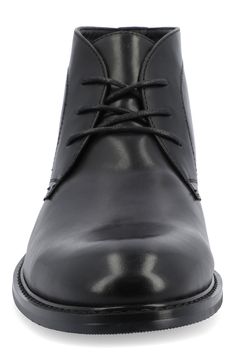 Elevate your work-to-weekend look in this refined faux-leather chukka boot featuring tonal stitch construction, breathable lining and a Tru Comfort Foam insole. Synthetic upper/textile lining/rubber sole Imported Classic Waterproof Work Boots, Leather Waterproof Work Boots For Business, Leather Waterproof Work Boots, Waterproof Leather Work Boots For Business, Classic Slip-resistant Work Boots, Black Leather Lined Chukka Boots For Work, Modern Workwear Chukka Boots With Round Toe, Casual Plain Toe Boots For Office, Casual Plain Toe Office Boots