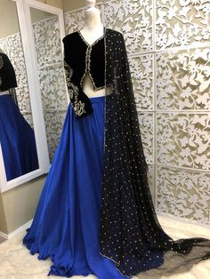 Black Cropped Jacket Embroidered Velvet Jacket with Blue Silk | Etsy Party Raw Silk Lehenga, Fitted Velvet Dupatta For Reception, Embellished Velvet Party Sets, Velvet Lehenga With Sheer Dupatta For Reception, Party Velvet Embellished Sets, Elegant Embroidered Velvet Lehenga, Elegant Velvet Lehenga With Sheer Dupatta, Traditional Drape Velvet Lehenga, Traditional Velvet Lehenga Fitted Drape