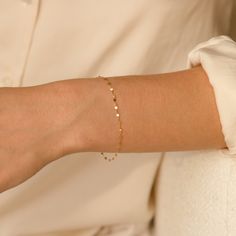 The Twisted Lace Chain Bracelet is an absolute must-have for your wrist. It’s dainty and adds just the right amount of feminine sparkle you have been looking for. If you’re looking for a bracelet you can wear every day - you've found it! It looks amazing on its own and dainty enough to pair with your other favorite bracelets. Crafted of 14k solid gold so you can wear it 24/7 - even to the gym, shower, and to sleep. This bracelet is a sparkly treasure that you'll never want to take off! DETAILS 1 Delicate Gold Bracelet Classy, Gold Dainty Bracelet, Permanent Bracelet, Delicate Gold Bracelet, Gold Bracelet Simple, Dainty Gold Bracelet, Permanent Jewelry, Solid Gold Bracelet, Bracelet Simple