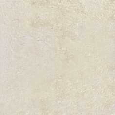 a close up view of a white marble tile textured with light brown and beige tones