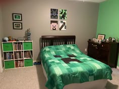 a bedroom with a bed, dresser and bookcases