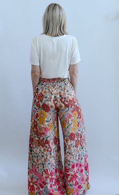 The Brighter Days Floral Pants are a must for your summer closet! The smocked waist band and floral print make these an extremely flattering look for all body types! These pants are detailed with a wide leg, side pockets, a gorgeous floral print and smocked waist band. You will be getting compliments all season long with the Brighter Days Floral Pants. - Fits true to size - Smocked elastic waist band - Side pockets - Floral print - Wide leg pants - Fabric: 100% Rayon - Model 1 wearing size 1XL 5 Cruise Clothes, Brighter Days, Summer Closet, Pants Plus Size, Pants Fabric, Cruise Outfits, Printed Wide Leg Pants, Favorite Daughter, Floral Pants