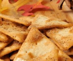 some crackers are piled on top of each other with cream cheese in between them