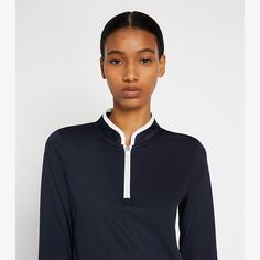 Our Half-Zip Performance Pullover is an essential layering piece on and off the court. Engineered in performance interlock, it is lightweight, moisture wicking and exceptionally breathable — with a flattering fit and stretch for full range of movement. Printed Silk Shirt, Tennis Skirts, Designer Tops, Half Zip Pullover, Sporty Outfits, Turtle Neck Dress, Tennis Skirt, The Court, Designer Outfits Woman