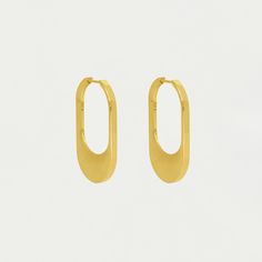 Want to look put-together with minimal effort? This hoop is for you. Taking cues from New York City with a fluid shape, just-right thickness and brushed finish, these hinge-closure earrings give any outfit a modern edge.
Material: DD Signature brushed 18kt gold and high polish edges over high-quality brass.
Length:  1.42" / 36mm
Note: In some hinged styles, the closure may loosen over time. To fix this, gently push the post upward with your thumb until it aligns tightly with the clasp, restoring Modern Oval Hoop Earring Sold Individually, Modern Oval Hoop Earrings, Modern Small Hoop Earrings, Modern Polished Hoop Earrings For Everyday, Modern Hoop Huggie Earrings, Modern Small Hoop Huggie Earrings, Contemporary Single Hoop Earring, Virtual Fashion, Gift Card Sale