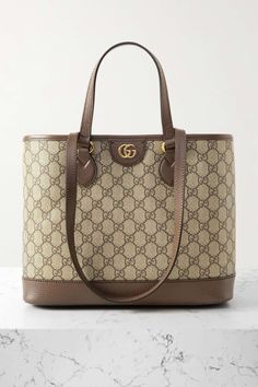 GUCCI Ophidia Tess embellished leather-trimmed printed coated-canvas shoulder bag | NET-A-PORTER Gucci Bags Handbags, Gucci Ophidia Bag, Tote Bag Outfit, Gucci Handbags Outlet, Shop Gucci, Gucci Tote Bag, Gucci Ophidia, Gucci Tote, Swag Bag