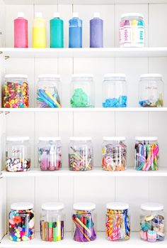 the shelves are filled with different types of craft supplies