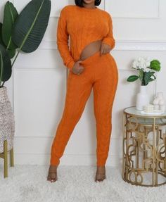 Transform your wardrobe with the "Laura" Pant Set! This versatile set features a stretch cable knit design, a round neckline, and long sleeves for all-day comfort. The asymmetrical top adds a unique touch, while the high-waisted pants with an elastic waistband provide a flattering fit. With a comfortable inseam of 34 inches. Made of 95% cotton and 5% spandex, this set is both stylish and comfortable. Two Piece Jumpsuit, Knit Jumpsuit, Long Sleeve Pullover Sweater, Knit Leggings, Asymmetrical Tops, Trendy Clothes For Women, Womens Clothing Stores, Pant Set, Matching Dresses