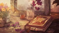 an open book sitting on top of a table next to a vase filled with flowers