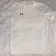 Under Armour T-Shirt, Never Worn, White, No Stains Or Pulls, Fitted Smoke Free Home Under Armour White T-shirt With Graphic Print, Under Armour Crew Neck Top, Under Armour Cotton Short Sleeve Shirt, White Under Armour T-shirt With Graphic Print, White Short Sleeve Sports T-shirt, Casual Crew Neck Top By Under Armour, Under Armour White Crew Neck Top, White Under Armour Crew Neck Top, Sporty Short Sleeve Tops By Under Armour