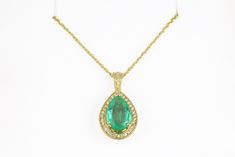 2.50tcw Colombian emerald & diamond halo gold necklace. This is a custom made emerald pendant crafted with pure 14K or 18K gold set with a natural emerald from Colombia and natural diamonds. Setting Style: Emerald Pendant Gold Pendant Weight: 4.2 Grams Gold Chain Weight: 4.5 Grams 16 Inches Setting Material: 18K, 14K White or Yellow Gold Main Stone: Colombian Emerald Grade Quality: AA+ Shape: Pear Cut / 10.0mm X 7.0mm Weight: Approx 2.20 Cts Total Stones: 1 Cut: Excellent Clarity: Translucen Green Necklace With Halo Setting For Wedding, Green Halo Setting Necklace For Wedding, Formal Emerald Necklace With Halo Setting, Emerald Diamond Pendant, Emerald And Diamond Necklace, Pear Pendant, Zambian Emerald, Emerald Pendant, Colombian Emeralds