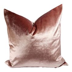 a pink and brown pillow on a white background