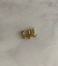 14k Yellow Gold Elephant Clasp Solid 14k yellow gold cute elephant clasp clip Measures approx 15.5mm x 11.5mm with bail or small ring that has 1mm opening. Tiny Elephant, Gold Elephant, Small Ring, Santa Clarita, Cameo Ring, Elephant Charm, Cute Elephant, Small Rings, High Quality Jewelry