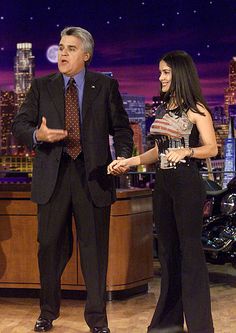 an older man and young woman on the tonight show