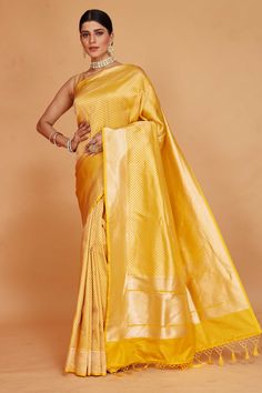 Shop yellow Katan Banarasi saree online in USA with overall zari work. Look your best on festive occasions in latest designer saris, pure silk sarees, Kanjivaram silk sarees, handwoven saris, tussar silk sarees, embroidered sarees from Pure Elegance Indian clothing store in USA.-full view Festive Yellow Katan Silk Saree, Yellow Katan Silk Pre-draped Saree For Diwali, Traditional Yellow Katan Silk Saree, Yellow Katan Silk Pre-draped Traditional Saree, Unstitched Yellow Katan Silk Saree, Tussar Silk Sarees, Indian Clothing Store, Saree Online, Banarasi Saree