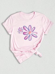 This beautiful daisy flower shirt is the perfect addition to any plant lover's wardrobe. The vintage floral design is both elegant and timeless, making it a great gift for women of all ages. Whether you're celebrating a birthday, Mother's Day, or just want to show someone you care, this botanical shirt is sure to put a smile on their face. The daisy flower symbolizes purity, innocence, and new beginnings, making it a thoughtful choice for a kindness shirt. The wildflower shirt features a unique Pink Floral Print Short Sleeve T-shirt, Pink T-shirt With Plant Print, Short Sleeve, Spring Pink T-shirt With Plant Print, Cute Floral Print Crew Neck T-shirt, Pink Cotton T-shirt With Floral Print, Pink Floral Print Cotton T-shirt, Pink T-shirt With Floral Embroidery And Short Sleeves, Pink T-shirt With Plants Print In Relaxed Fit, Vintage White T-shirt With Floral Print