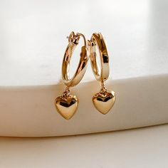 Dangle Heart Hoop Earrings - Gold Filled - Adorned by Ruth Heart Shaped Gold Earrings, Heart Earrings Gold, Gold Heart Dangle Earrings, Gold Hoop Earrings Aesthetic, Minimalist Accessories Jewellery, Cute Hoop Earrings, Hoop Earrings With Charm, Hoop Earrings Aesthetic, Golden Earring