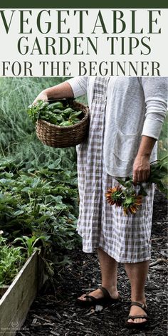 A lady in the garden holding a basket full of vegetables. Gardening Journal Printables, Bed Types, Gardening Basics, Garden From Scratch, Gardening Journal, Soil Types, Veggie Gardens