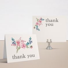 two thank you cards sitting next to each other