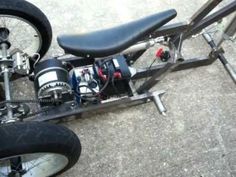 a close up of a motor bike on the ground