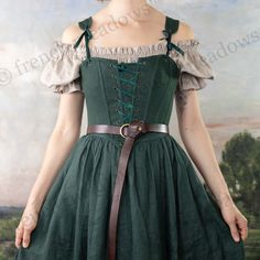 Our High Back Renaissance Bodice is inspired by historical corsets and bodices of yore. Rich green linen and historical details make this corset perfect for your Outlander cosplay, Renaissance Faire costume, or visit to the local tavern.  Reinforced with more boning than our classic Renaissance Bodices, and complete with both front and back lacing for an extra adjustable fit, this corset is sure to be a staple in your Renaissance Festival wardrobe. Welcome to French Meadows, your dream shop for Outlander Cosplay, French Meadows, Korsett Top, Linen Corset, Yellow Corset, Ren Faire Outfits, Outlander Costumes, Wedding Corset, Corset Shop