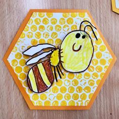 a card with a drawing of a bee on it