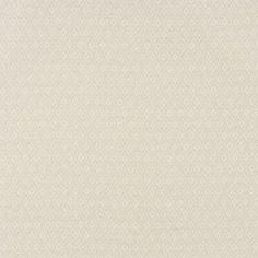 a beige background with small white dots