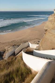 Sharp, spiraling white staircase leading down to a wide and empty beach along Portugal's beautiful Silver Coast in the middle of winter. Portugal Beach House, Silver Coast Portugal, Portugal Winter, House In Portugal, Beach House Portugal, Portugal In Winter, Portugal Photography, Portugal Coast, Portugal Beaches