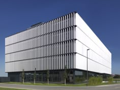 an office building that is white and black