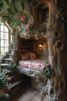 a bedroom with a tree house built into the side of it's wall and bed