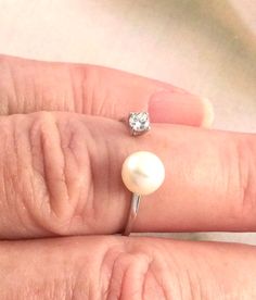 Stunning Vintage Gold Filled Genuine Pearl Ring Ring size N 1/2  - inside diameter of the ring band is 1.7 cm (this is a small ring size) The stunning quality genuine Pearl  is 6 mm wide and is securely set the white Moisannite accent stone is 3 mm wide Stamped S925. Total weight is 1.12 grams A stunning Ring, in excellent condition (Box for display purposes only) Customs and import taxes Buyers are responsible for any customs duties and import taxes charged by their respective Governments Selle Deco Dress, Art Deco Dress, Small Ring, Pearl And Diamond Ring, Antique Diamond Rings, Ring Antique, Small Rings, Dress Jewelry, Antique Art Deco