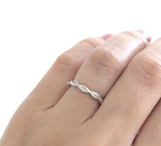 ◆IMPORTANT INFORMATION◆ This ring will arrive in a luxury gift box, accompanied by a blank card, care instructions, and a jewelry cleaning cloth. Our sterling silver rings are dipped in rhodium, to give them a lustrous white gold appearance, and to prevent discoloring and tarnish. Our commitment is to provide you with a high-quality piece of jewelry that you can wear forever. We proud ourselves in using only the finest stones in the market. Our flawless cubic zirconia stones have the same sparkl Hypoallergenic Cubic Zirconia Wedding Rings, Wedding Hypoallergenic Stackable Rings With Round Band, Silver Diamond Cut Eternity Band As Gift, Silver Eternity Band With Diamond Cut As Gift, Gift Eternity Band With Diamond Cut, Stackable Eternity Band Ring As A Gift, Silver Eternity Band Ring As Gift, Adjustable Silver Eternity Band For Gift, Band Wedding Ring