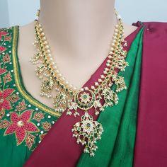 "Handmade Indian Jewelry item * Stunning Hand made traditional jewelry set. * Necklace Set is a combo of Necklace & Stud Earrings * Necklace is adjustable with adjustable back chain/ Dori/ Cord * Necklace Length: 10\", Necklace Weight: 3.75 Oz/ 105 Gm * Each Earring Weighs: 0.20 Oz/ 5 Gm, Earring Length: 1.5\", Earring Width: 0.5\" * Packed in a box, Ideal For GiftingOn Request, We Can Add A Custom Message For Your Loved One (At No Additional Cost) :) Color, shades, texture displayed may sli Temple Jewelry Kundan Necklace With Peacock Design For Celebrations, Traditional Kundan Necklace With Peacock Design, Temple Jewelry Necklace With Peacock Design, Temple Jewelry Bridal Necklace With Peacock Design For Puja, Traditional Jewelry Sets With Peacock Design For Festive Occasions, Traditional Peacock Design Jewelry Sets For Puja, Traditional Peacock Design Jewelry Sets For Festivals, Traditional Festive Jewelry Sets With Peacock Design, Traditional Peacock Design Jewelry For Diwali