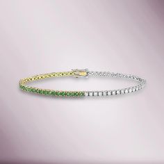 Beautiful Diamond Tennis Bracelet. A staple in your jewelry collection. Handmade in New York City. This tennis Bracelet showcases a delicate box chain embellished with dozens of shimmering white diamonds. Quality to us is important and that is why we hand select our diamonds for premium quality. Total Diamond Weight: D Green Diamond Bracelets With Brilliant Cut, Green Diamond Bracelet With Brilliant Cut, Green Diamond Tennis Bracelet For Formal Occasions, Green Brilliant Cut Diamond Bracelet In Fine Jewelry Style, Green Brilliant Cut Diamond Bracelet Fine Jewelry, Green Brilliant Cut Diamond Bracelet, Formal Green Diamond Tennis Bracelet, Green Tennis Bracelet With Prong Setting For Anniversary, Green Diamond Tennis Bracelet With Prong Setting