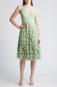 A floral-embroidered mesh skirt floats over the minidress base layer of this alluring midi that can easily dance the night away. 44 1/2" length (size Medium) Hidden back-zip closure Deep V-neck Lined 100% nylon Dry clean or hand wash, line dry Imported Summer Floral Embellished Knee-length Midi Dress, Feminine Sheer Bodice Dress For Spring, Summer Evening Lace Dress With Floral Embroidery, Feminine Spring Dress With Sheer Bodice, Elegant Spring Lace Mesh Dress, Floral Embellished Midi Cocktail Dress, Floral Embellished Midi Dress For Cocktail, Evening Midi Dress With Floral Embroidery For Spring, Chic Mesh Dress With Sheer Bodice For Spring