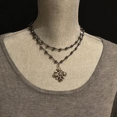 "❤️❤️  20% off and Free Shipping ❤️❤️ Two strand dark gray black hematite rosary chain with your choice of cross or Fleur de lis pendant.  Made to order from 16-20\". Please message me for other variations in length or single strand.  Chain has gunmetal plated chain with 6mm dark gray black hematite beads. Really beautiful and eye catching chain! Choose from 1. Small Fleur de lis, 2. Rustic Cross, 3. Crystal Fleur de lis, 4. Crystal Cross, 5. Maltese Cross, or 6. Bumpy Cross.  - Spiritual gift for wife, girlfriend, mom, sister or friend - packaged in a complimentary silk zippered jewelry bag for gifting - Free Shipping Promote good omens and karma - The cross is the ultimate symbol of spiritual faith, devotion and love. Crosses are seen to ward off evil and bring spiritual protection, heal Black Vintage Jewelry, Cool Jewelry Necklaces, Rosary Chain Necklace, Rosary Style Necklace, Zipper Jewelry, Medieval Gothic, Cross Choker, Dark Jewelry, Gothic Accessories