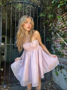 Be the life of the party in the Bella Strapless Babydoll Dress! This gorgeous mini dress is fully lined with an organza overlay. Available in blush pink, blue, black, and white. | dress aesthetic | sorority rush dresses | sexy mini dresses | black mini dress | pink mini dress | blush pink | Balletcore Dress | Organza Mini Dress Chic A-line Organza Mini Dress, Organza Mini Dress For Night Out, Summer Strapless Organza Mini Dress, Lined Mini Dress For Prom, Flirty Mini Dress For Spring Prom, Flirty Spring Mini Dress For Prom, Strapless Mini Dress For Night Out In Spring, Spring A-line Organza Mini Dress, Flowy Summer Mini Dress For Prom