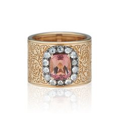 Emily's Garden One-of-a-Kind Arbor Wide Cigar Band in 14k Yellow Gold with Faceted Cushion Pink Tourmaline (1.62 ct) and Pavé White Rose-Cut Diamonds (0.28 ct) Set in Black Rhodium This ring is made to order. Lead time is approximately 4 weeks. Known for its historical reinterpretations, Larkspur & Hawk is pleased to introduce Illustrated, a new capsule collection inspired by a collaborative wallpaper design entitled Emily's Garden. The collection celebrates the many ways in which founder ... Luxury Jewelry With Rose Cut Diamonds And Pink Sapphire, Luxury Pink Gold Morganite Jewelry, Luxury Tourmaline Rings With Rose Cut Diamonds, Luxury Tourmaline Jewelry With Rose Cut Diamonds, Luxury Tourmaline Rings, Luxury Engraved Ring With Rose Cut Diamonds, Luxury Pink Sapphire Ring In 14k Gold, Luxury Gold Tourmaline Rings, Garden Arbor