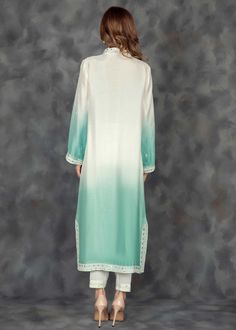 Spring green ombre pure rawsilk shirt all handworked with white resham and mirrorwork details on the neckline, sleeves, front and back of the shirt (Includes shirt only) Cotton Silk Kurta With Embroidered Sleeves, Long Sleeve Cotton Silk Kurta With Embroidered Sleeves, Summer Cotton Silk Kurta With Mirror Work, Designer Long Sleeve Tunic With Dupatta, Summer Long Sleeve Kurta With Mirror Work, Long Sleeve Tops With Mirror Work For Eid, Silk Long Sleeve Blouse With Mirror Work, Ombre Shirt, Astoria Ny